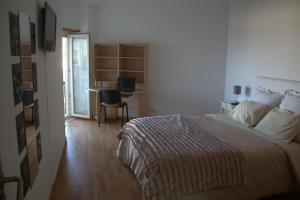 Кровать или кровати в номере Ericeira Sunset Apartment