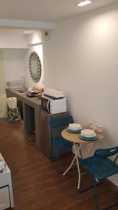 Η κουζίνα ή μικρή κουζίνα στο Wora Stay room Kata beach
