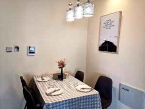 Fotografie z fotogalerie ubytování Sea View Apartment Qingdao North Railway Station Branch v destinaci Xiazangtuan
