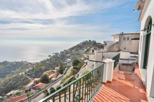 a balcony with a view of the ocean at Casa Irma in Ravello