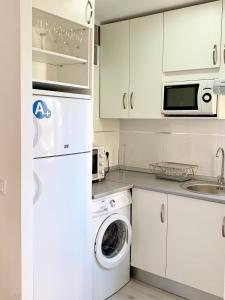 Kuchyňa alebo kuchynka v ubytovaní Apartamento Góndolas