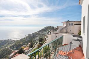 a balcony with a view of the ocean at Casa Irma in Ravello