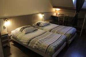 Postel nebo postele na pokoji v ubytování Hotel Valérie