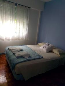 Postel nebo postele na pokoji v ubytování Isurus departamento completo