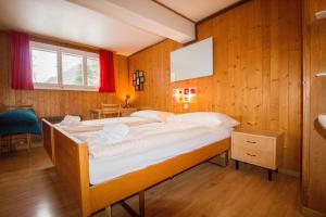 A bed or beds in a room at Hotel Hornerpub