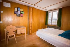 A bed or beds in a room at Hotel Hornerpub