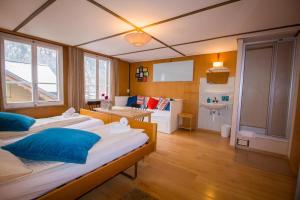 Postel nebo postele na pokoji v ubytování Hotel Hornerpub