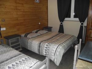 Postel nebo postele na pokoji v ubytování Hotel Valérie