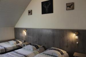 Postel nebo postele na pokoji v ubytování Hotel Valérie