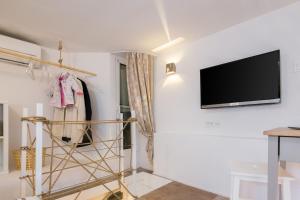 TV a/nebo společenská místnost v ubytování Rooms N&M