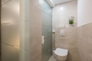 Koupelna v ubytování Rooms N&M