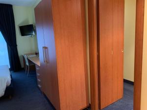 Uma cama ou camas num quarto em Best Western Hotel Class Lamezia