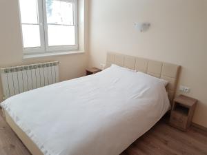 Posteľ alebo postele v izbe v ubytovaní Willa RYŚ