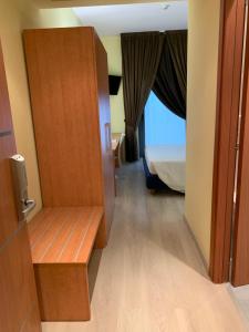 Uma cama ou camas num quarto em Best Western Hotel Class Lamezia