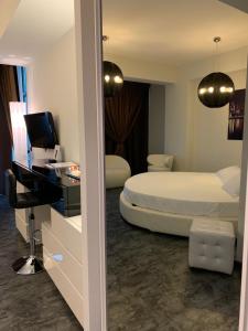 Uma cama ou camas num quarto em Best Western Hotel Class Lamezia