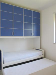 Ένα ή περισσότερα κρεβάτια σε δωμάτιο στο Appartamento dal marinaio Filippo