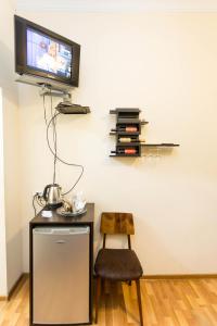 Telewizja i/lub zestaw kina domowego w obiekcie Gis Guest House