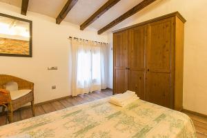 A bed or beds in a room at Country House Cadernera