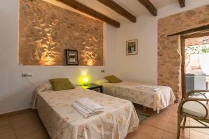 A bed or beds in a room at Country House Cadernera