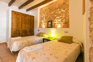 A bed or beds in a room at Country House Cadernera