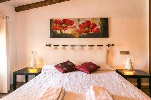 A bed or beds in a room at Country House Cadernera