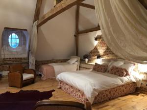 Postel nebo postele na pokoji v ubytování Chateau de Vauchelles