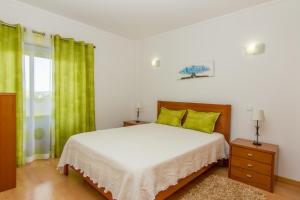 En eller flere senge i et værelse på Apartamentos Turisticos Rocha Tower - MI + 91 billeder