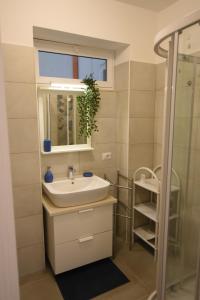 Vonios kambarys apgyvendinimo įstaigoje a casa di Annita