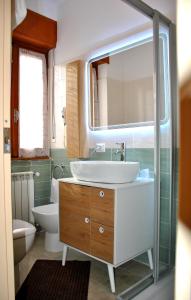 Koupelna v ubytování Albergo Motel Dosdè B&B