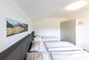 Posteľ alebo postele v izbe v ubytovaní Haus Scherz