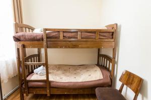 Łóżko lub łóżka w pokoju w obiekcie Gis Guest House