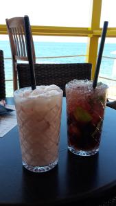 two drinks are sitting on a table at Apartments Judit in Tar +51 photos