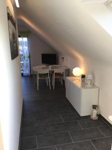 TV a/nebo společenská místnost v ubytování Ferienhaus Talblick