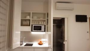 Kuchyň nebo kuchyňský kout v ubytování B&B Xenia