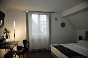 Postel nebo postele na pokoji v ubytování Hotel Sporcher Nest + 37 fotografií