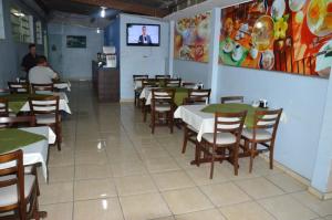 A restaurant or other place to eat at Alfa Hotel Vespasiano