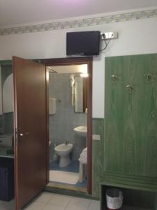 Koupelna v ubytování Hotel Harry's