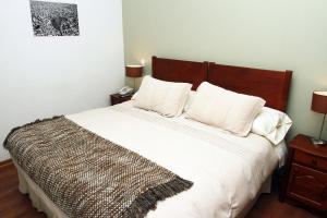 Katil atau katil-katil dalam bilik di Hotel Loreto