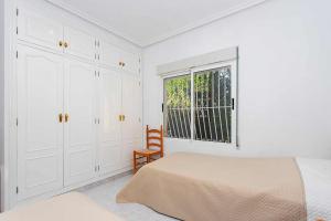 Postel nebo postele na pokoji v ubytování CH Villa Calliandra Ciudad Quesada + 41 fotografií