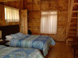 Postel nebo postele na pokoji v ubytování Reserva Azul