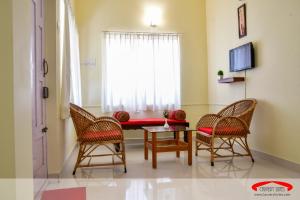 Fotografie z fotogalerie ubytování Cauvery Suites v destinaci Madikeri