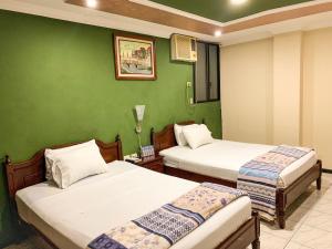 Postel nebo postele na pokoji v ubytování Hotel Somagg