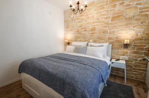 Ліжко або ліжка в номері L&L Leisure Apartments Plitvice