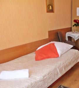 Postel nebo postele na pokoji v ubytování Hotel Bursztyn