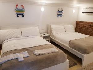 A bed or beds in a room at One Bedroom Chalet managed by Lilly Apartments
