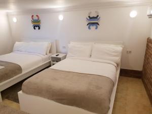 A bed or beds in a room at One Bedroom Chalet managed by Lilly Apartments