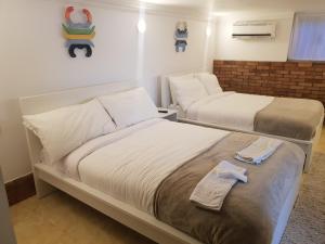A bed or beds in a room at One Bedroom Chalet managed by Lilly Apartments