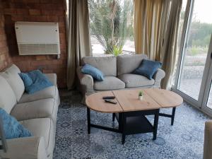 A seating area at One Bedroom Chalet managed by Lilly Apartments