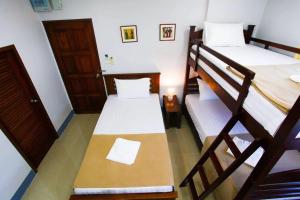 Ein Bett oder Betten in einem Zimmer der Unterkunft Chean-Chean House