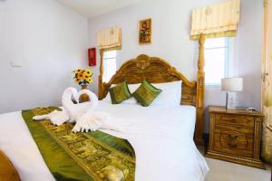 Ein Bett oder Betten in einem Zimmer der Unterkunft Chean-Chean House